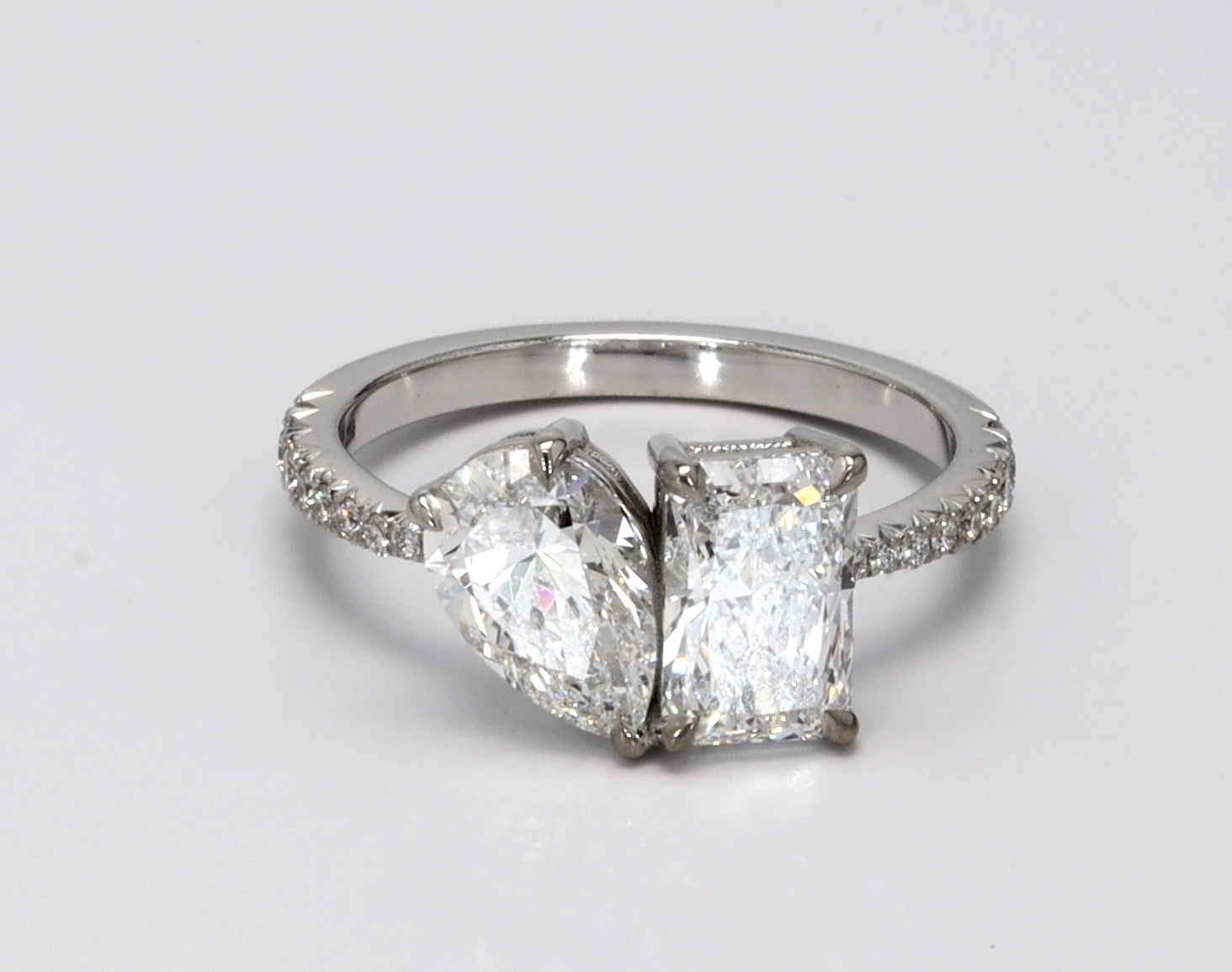 Radiant and Pear Diamond Engagement Ring with Whitegold setting.